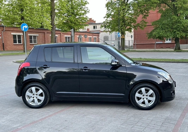 Suzuki Swift cena 16900 przebieg: 121000, rok produkcji 2009 z Gniezno małe 497